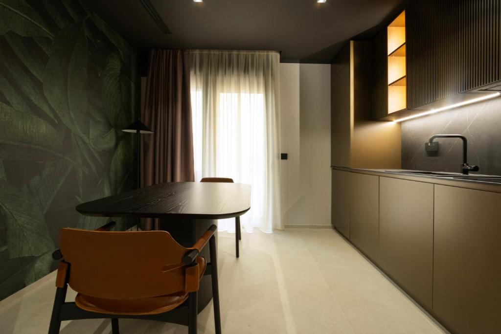 Kuchyň nebo kuchyňský kout v ubytování Villa Della Lupa Luxury Rooms