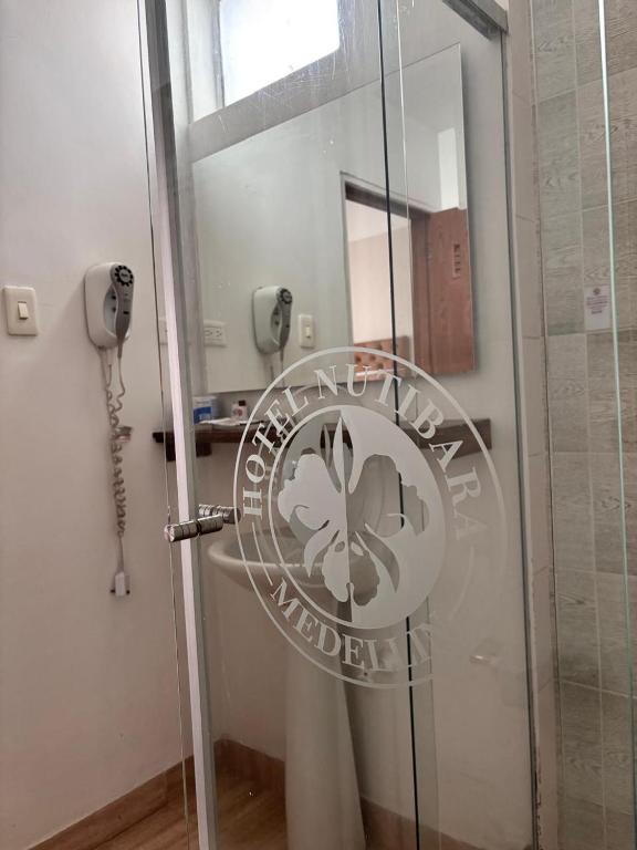 Koupelna v ubytování Hotel Nutibara