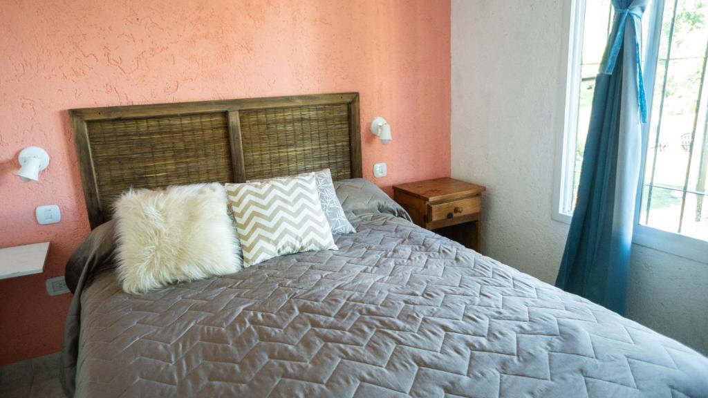 Ένα ή περισσότερα κρεβάτια σε δωμάτιο στο PUEBLO MIO