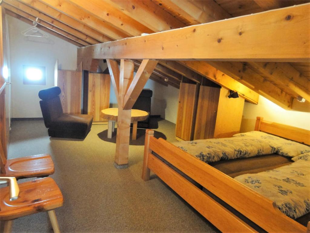 Postel nebo postele na pokoji v ubytování Haus Primula Pizol