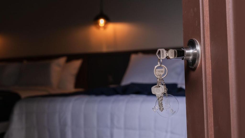 Postel nebo postele na pokoji v ubytování Hotel Boutique Nueva Valladolid