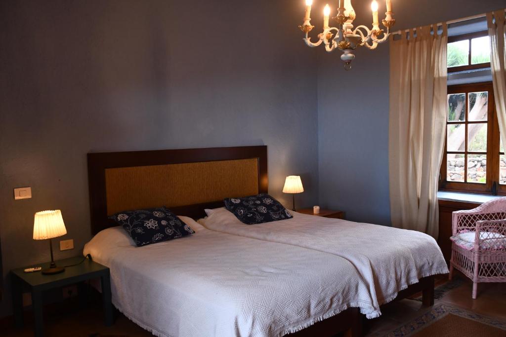 Postel nebo postele na pokoji v ubytování Haciendas del Valle - Casa San Miguel