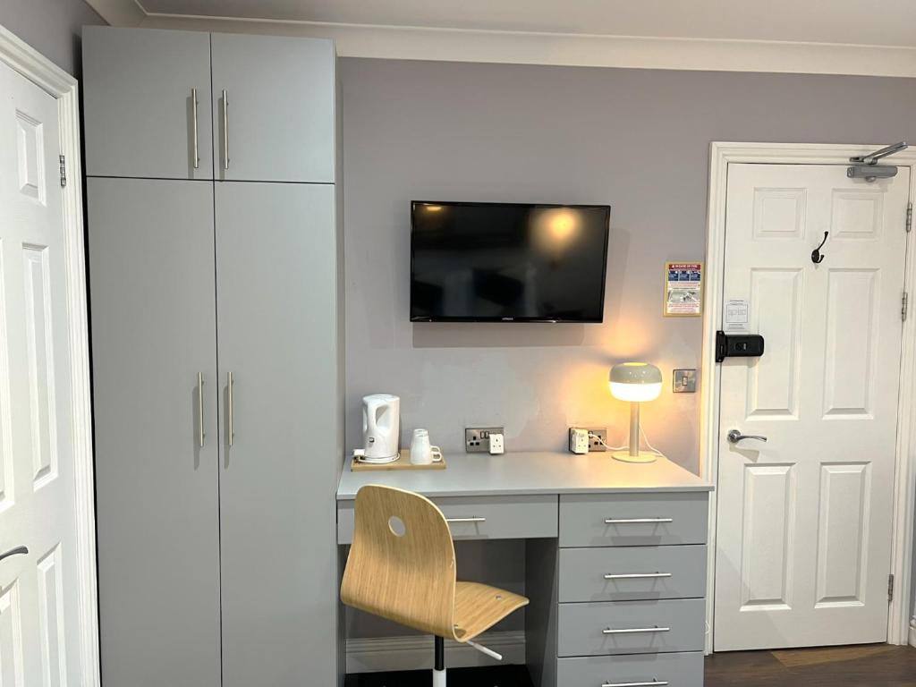 TV a/nebo společenská místnost v ubytování Melbury Rooms & Studios