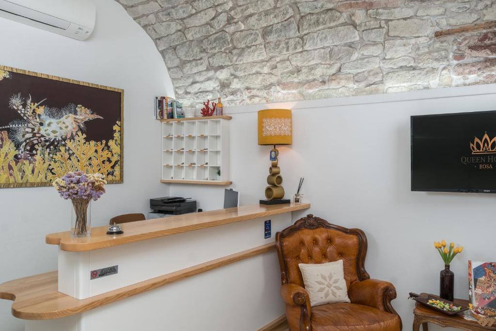 TV a/nebo společenská místnost v ubytování Bosa Queen House