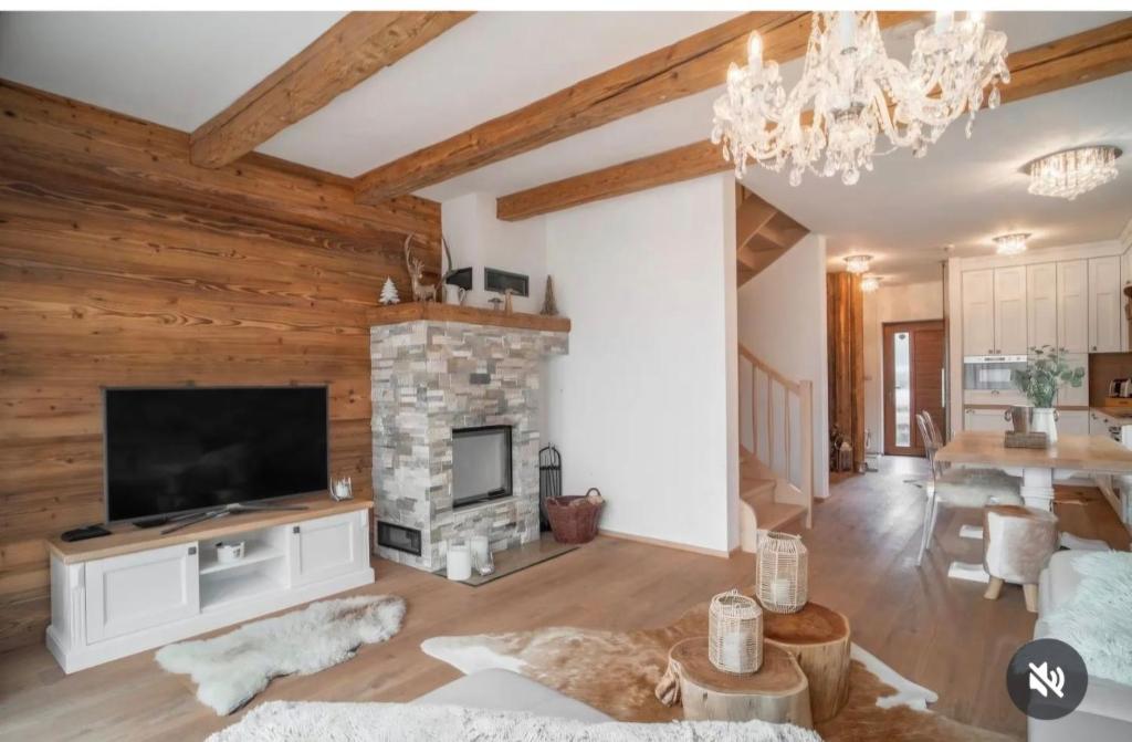 TV a/nebo společenská místnost v ubytování Chalet Rebeca 12 beds Donovaly
