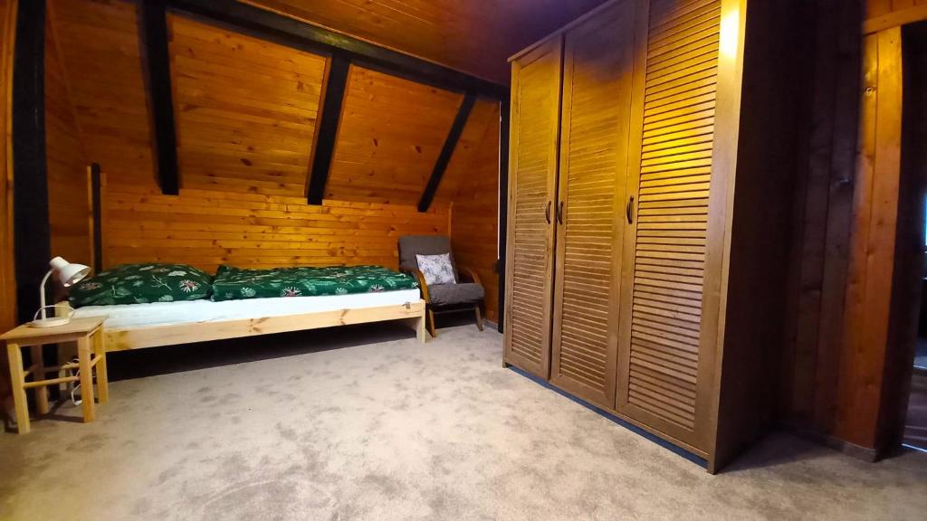 Postel nebo postele na pokoji v ubytování Chalupa na lužické stezce