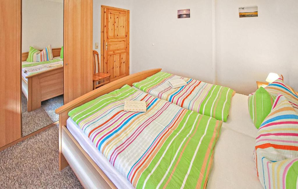 Postel nebo postele na pokoji v ubytování Ferienwohnung Mönchgut