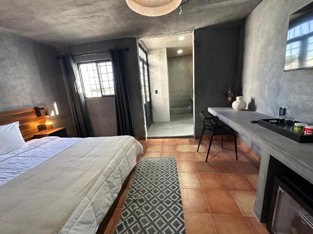 Postel nebo postele na pokoji v ubytování Hotel Damiana Boutique