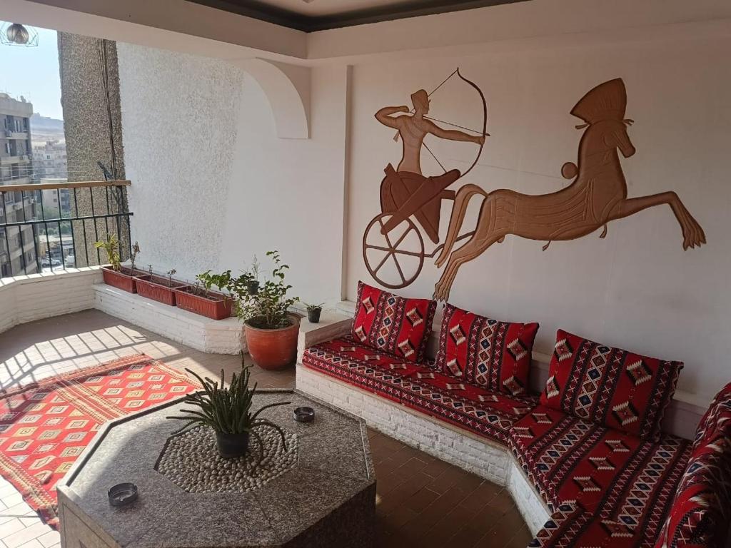 Posezení v ubytování Pyramids Nights Hostel