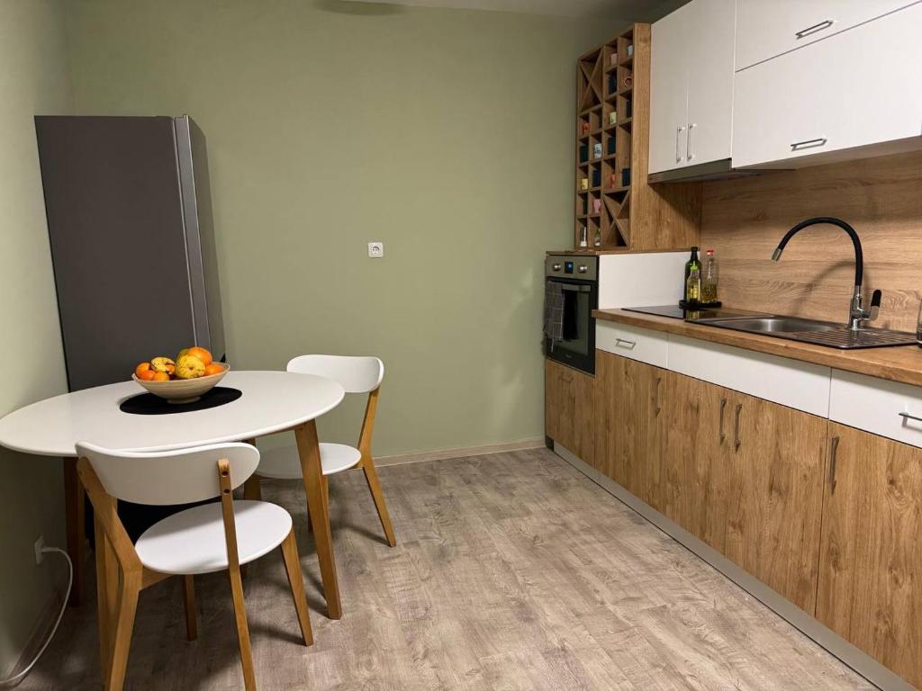 Kuchyň nebo kuchyňský kout v ubytování Olive Apartment with terrace B100 in Grand Resort Pamporovo