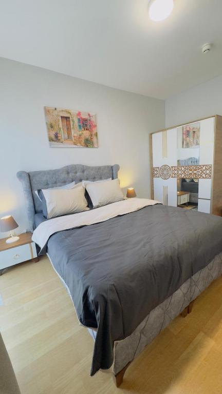 En eller flere senge i et værelse på Suites