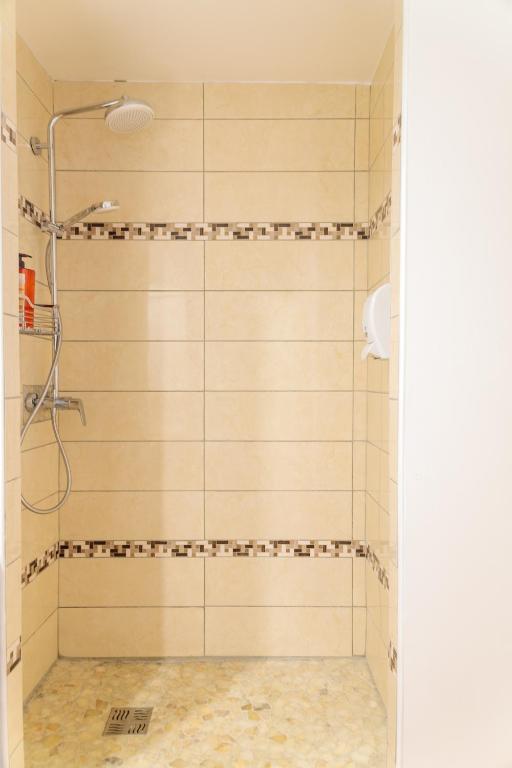 Koupelna v ubytování Appartements avec vue mer à Tartane
