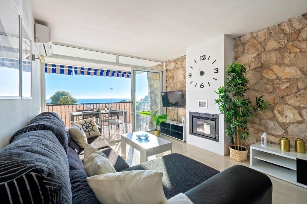 Posezení v ubytování Hauzify I Apartament Cala Crancs