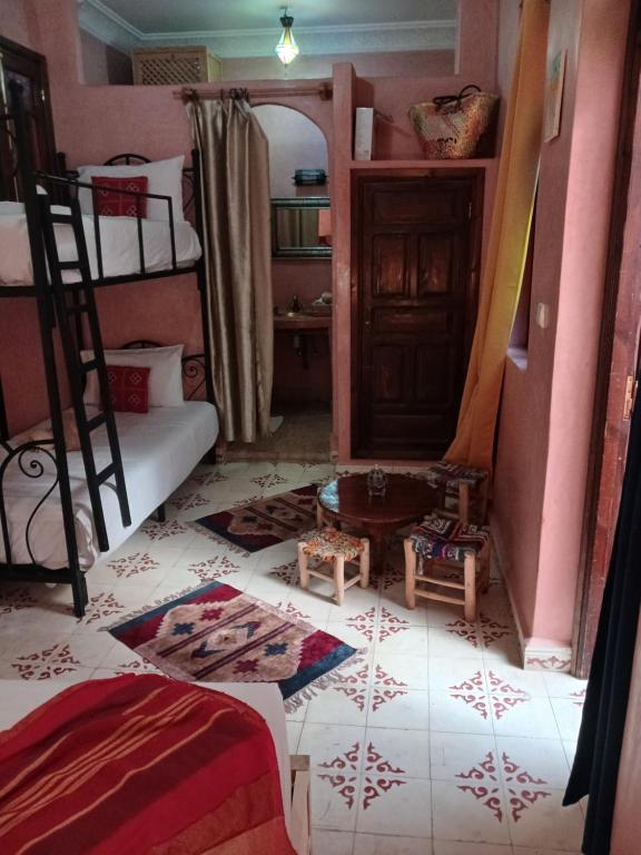 Postel nebo postele na pokoji v ubytování Riad Dantella