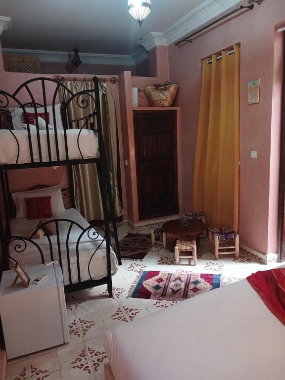 Postel nebo postele na pokoji v ubytování Riad Dantella