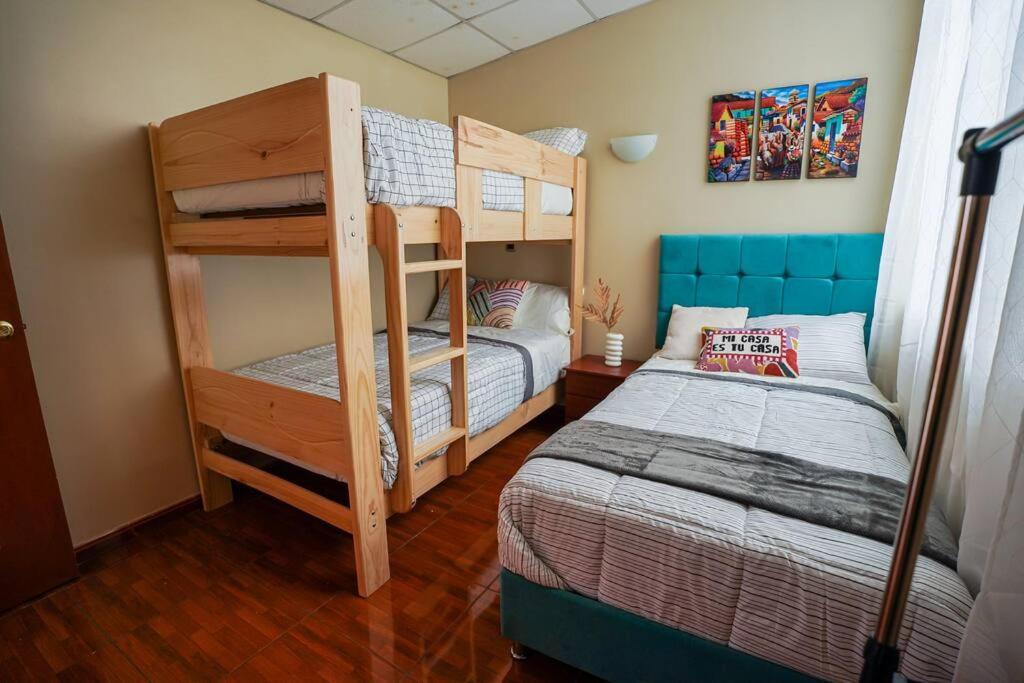 Postel nebo postele na pokoji v ubytování Sweet Home tu hogar en Cusco