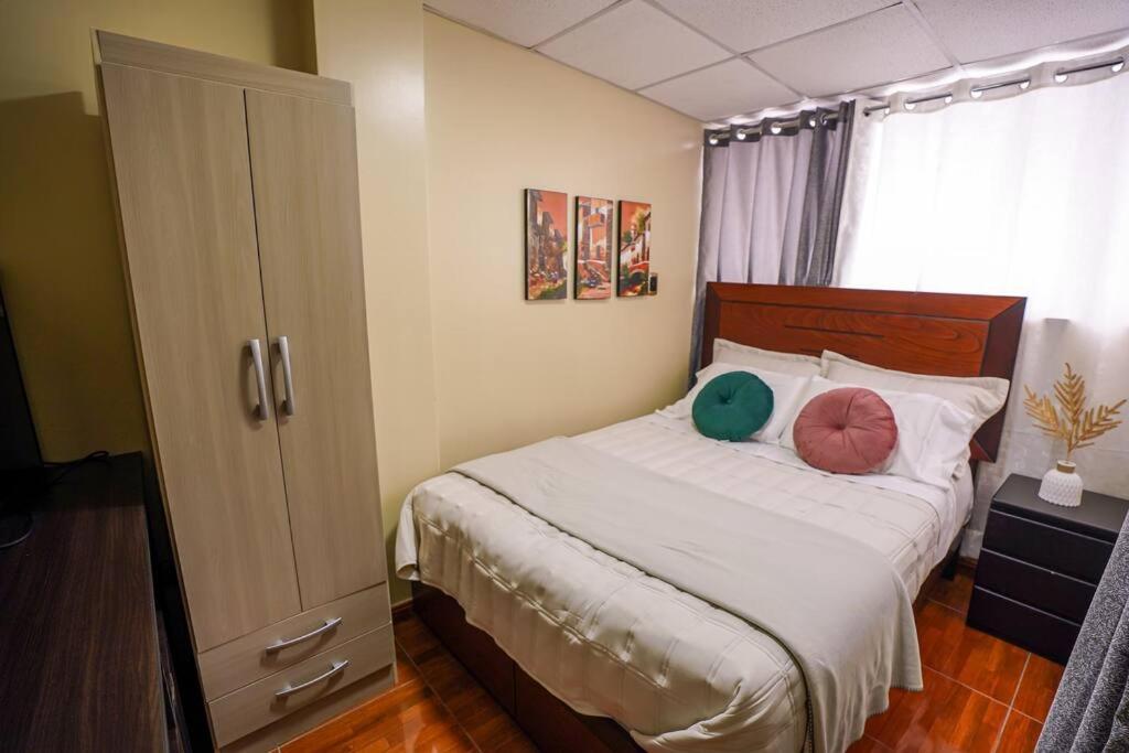Postel nebo postele na pokoji v ubytování Sweet Home tu hogar en Cusco