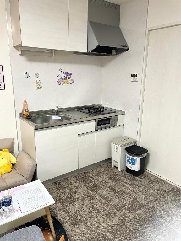 Kitchen o kitchenette sa 糖果屋 岸里玉出