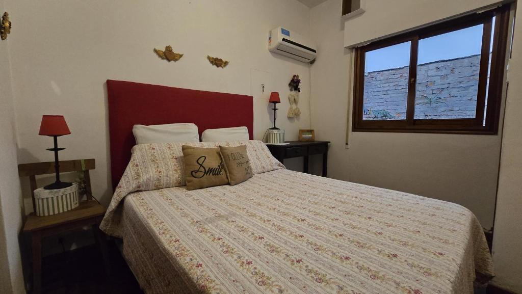 Ein Bett oder Betten in einem Zimmer der Unterkunft Mi Hogar tu Hogar