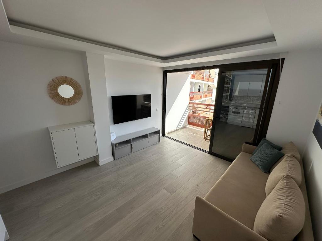 TV a/nebo společenská místnost v ubytování Luxury Danubio Ocean View