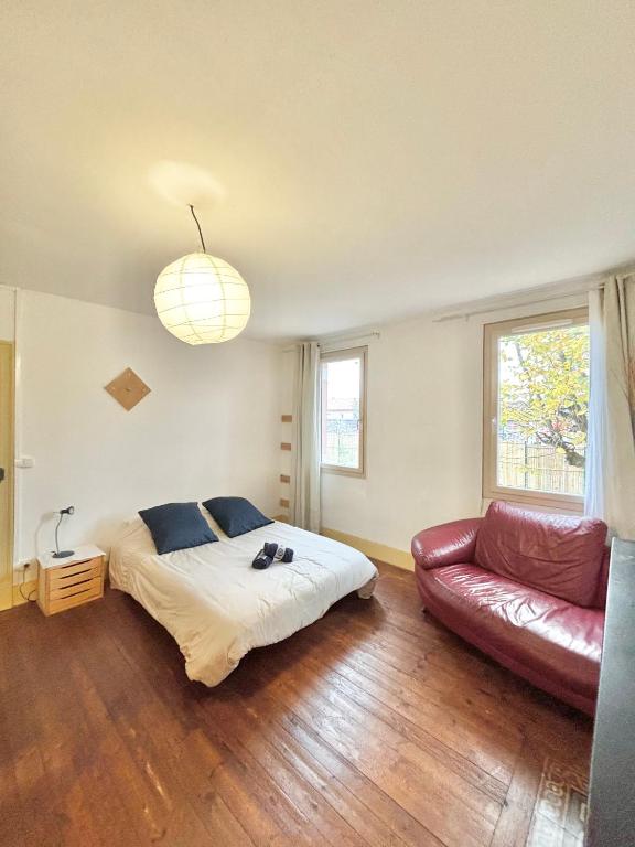 Postel nebo postele na pokoji v ubytování Chambre Bugrane
