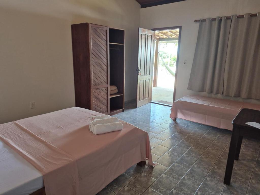 Postel nebo postele na pokoji v ubytování HOTEL FAZENDA BOLANDEIRA