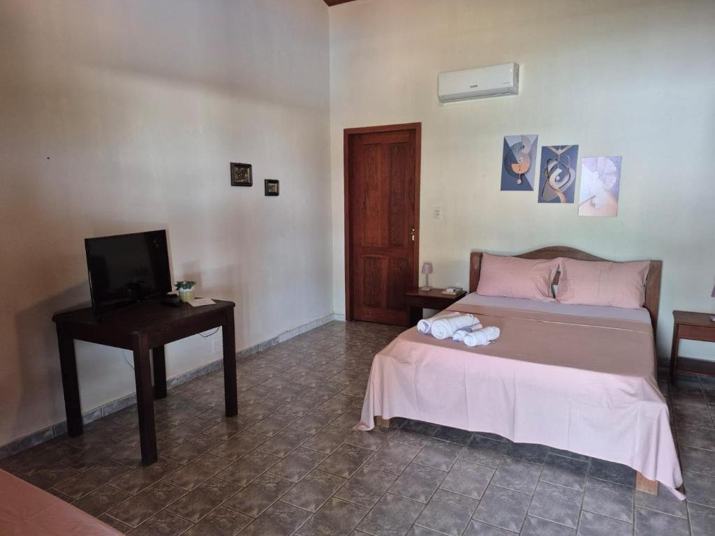 Postel nebo postele na pokoji v ubytování HOTEL FAZENDA BOLANDEIRA