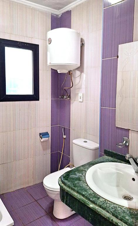 Koupelna v ubytování Arabesque Hotel
