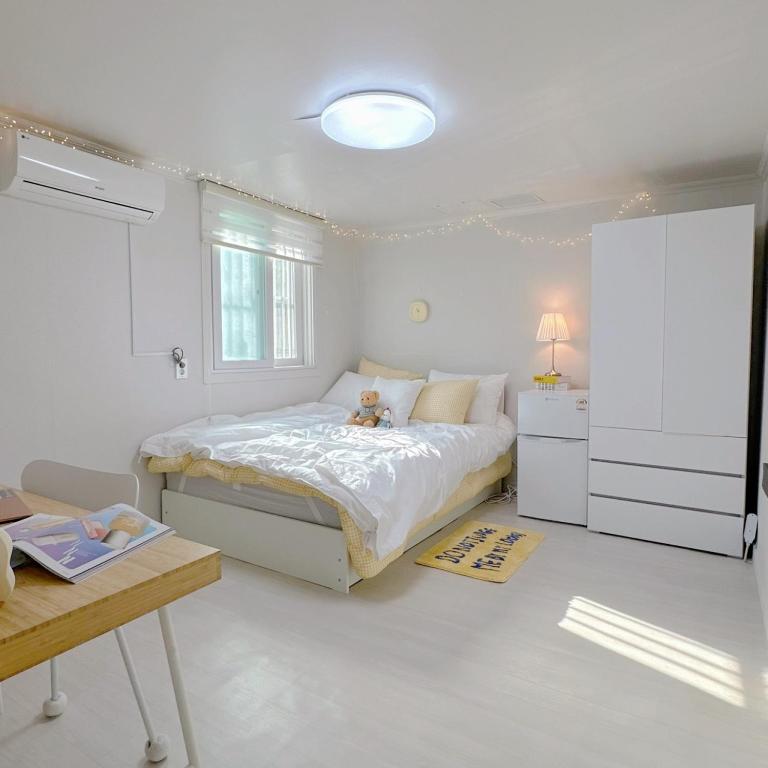 Postel nebo postele na pokoji v ubytování Rapym Coliving House