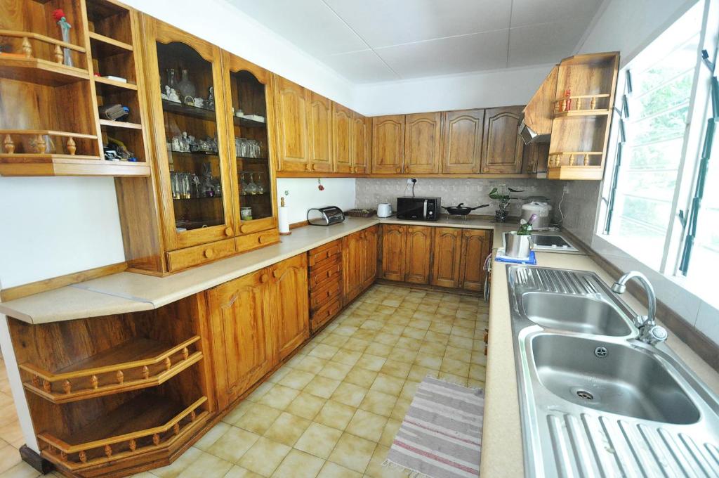 Kuchyň nebo kuchyňský kout v ubytování Petit Baie Chalets