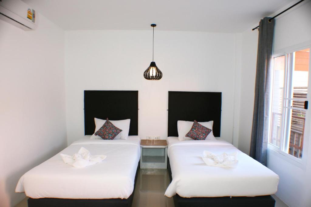 Postel nebo postele na pokoji v ubytování Non Du Lay Guesthouse