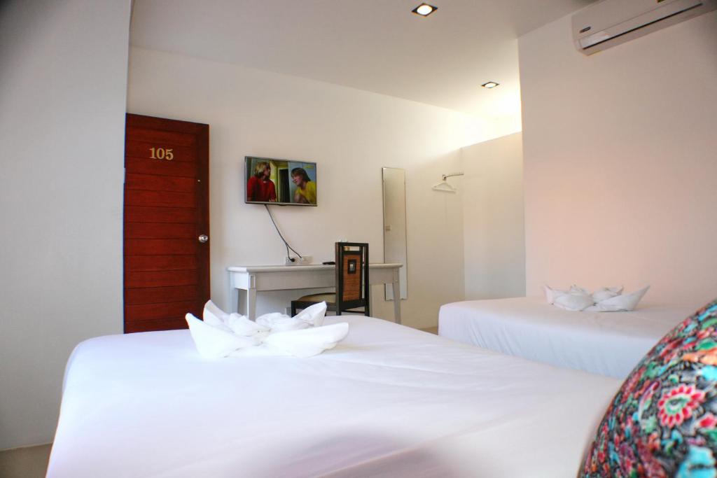 Postel nebo postele na pokoji v ubytování Non Du Lay Guesthouse