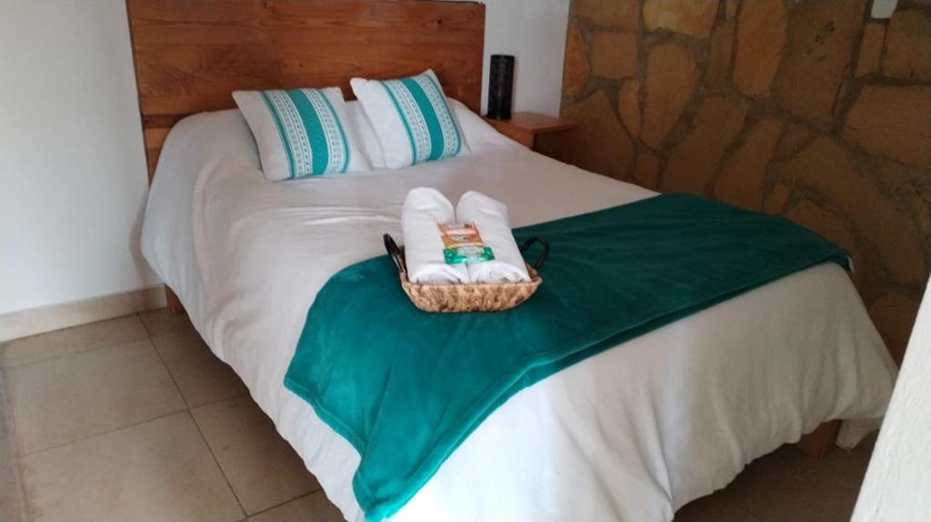Postel nebo postele na pokoji v ubytování Gaia Guest House