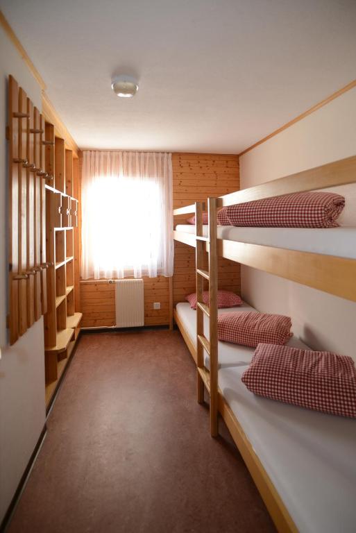 Postel nebo postele na pokoji v ubytování Erlebacherhus