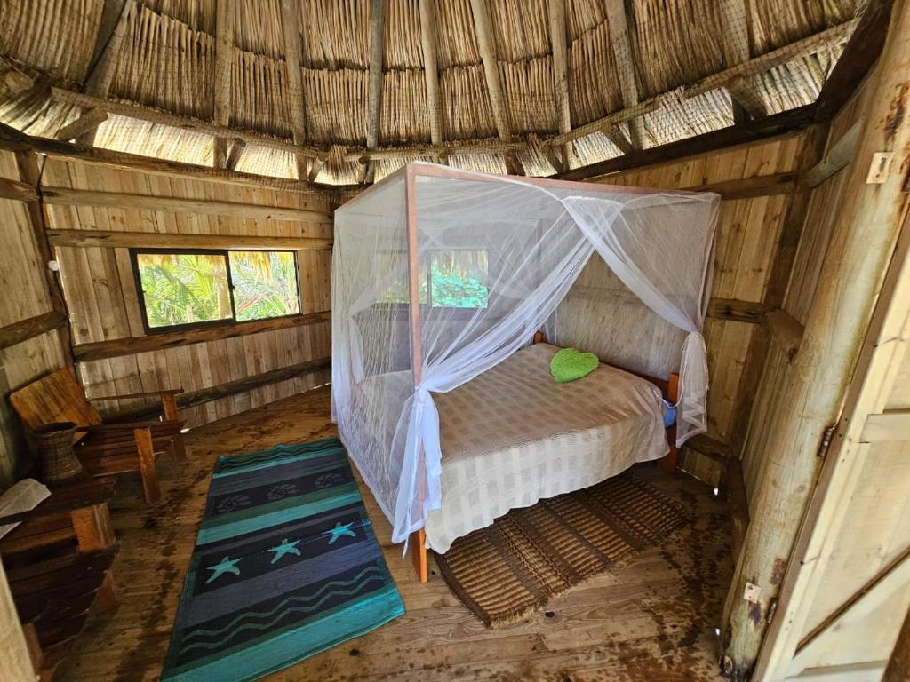Postel nebo postele na pokoji v ubytování Ecolodge Playa Brava Teyumakke