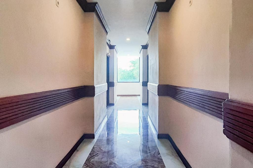 Fotografie z fotogalerie ubytování Urbanview Remington Hotel Palembang By RedDoorz v destinaci Palembang