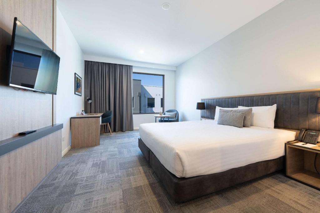 Postel nebo postele na pokoji v ubytování Ingot Hotel Perth, Ascend Hotel Collection