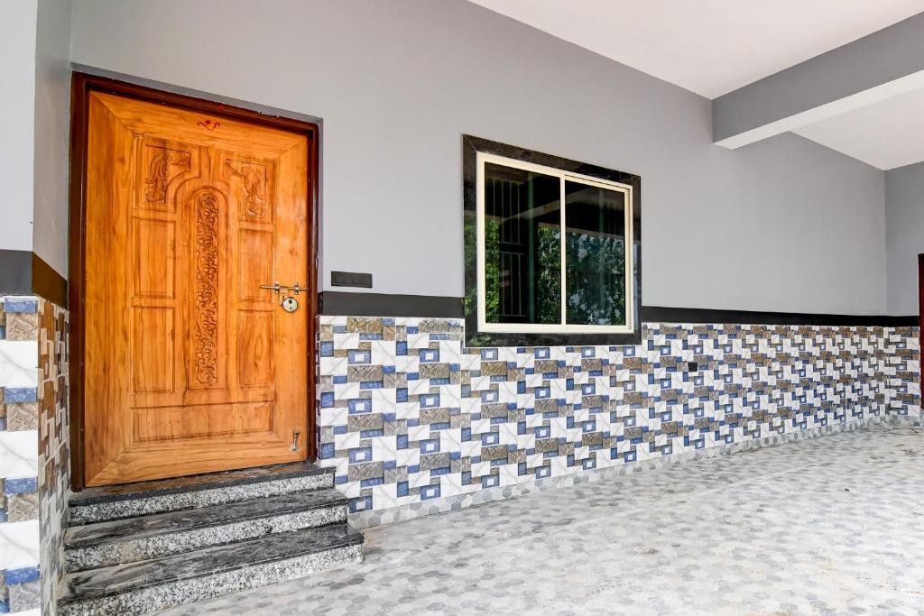 Fotografie z fotogalerie ubytování Super Hotel O MNJ Mansion v destinaci Jānla
