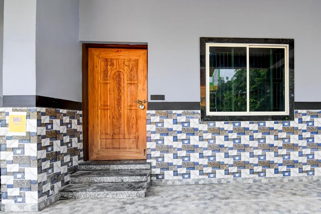 Fotografie z fotogalerie ubytování Super Hotel O MNJ Mansion v destinaci Jānla