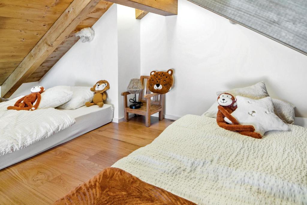 Postel nebo postele na pokoji v ubytování Pilanous Residence - E-Alpine Suite - Swiss Alps