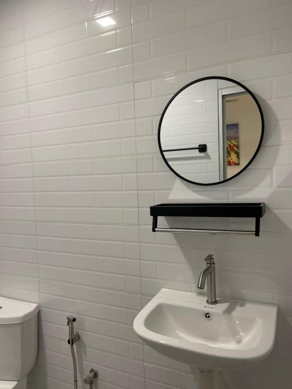 Koupelna v ubytování TDOZE Hotel
