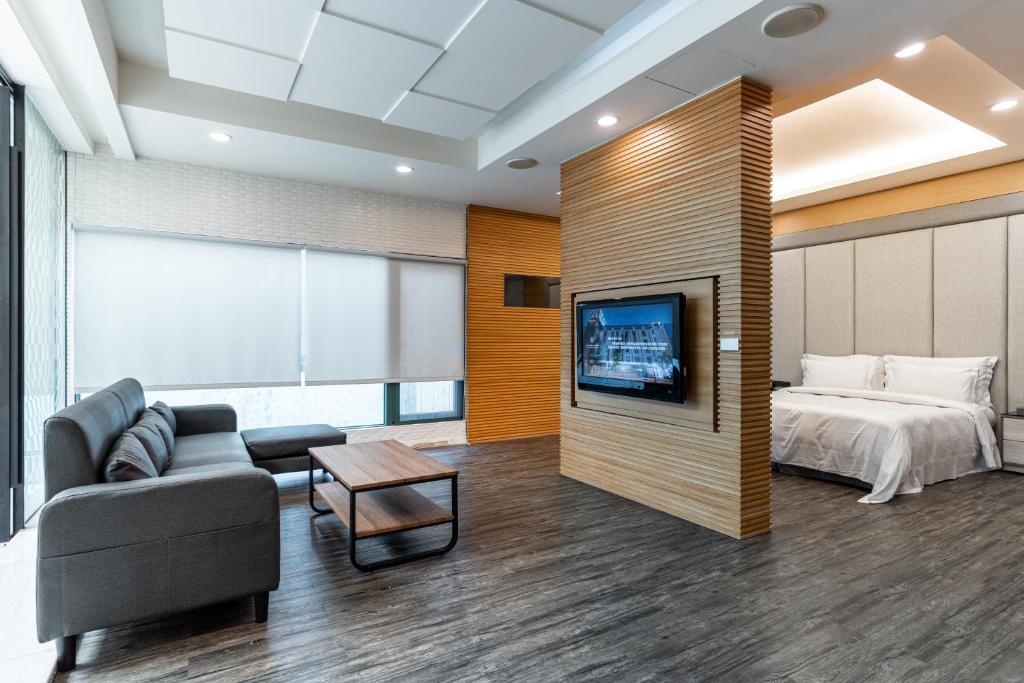 Postel nebo postele na pokoji v ubytování OHYA Chain Boutique Motel-Yongkang