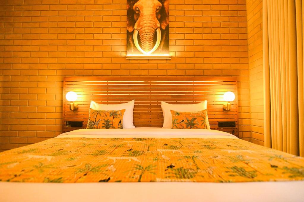 Postel nebo postele na pokoji v ubytování Dhalaya Resort Udawalawe