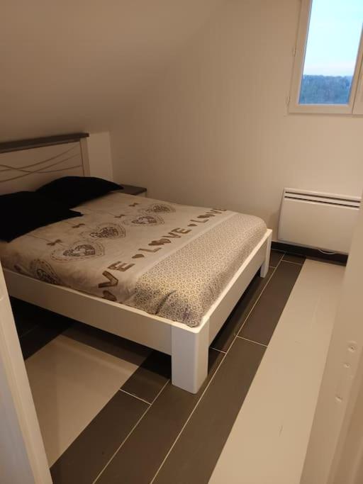 Postel nebo postele na pokoji v ubytování gîte dans endroit atypique