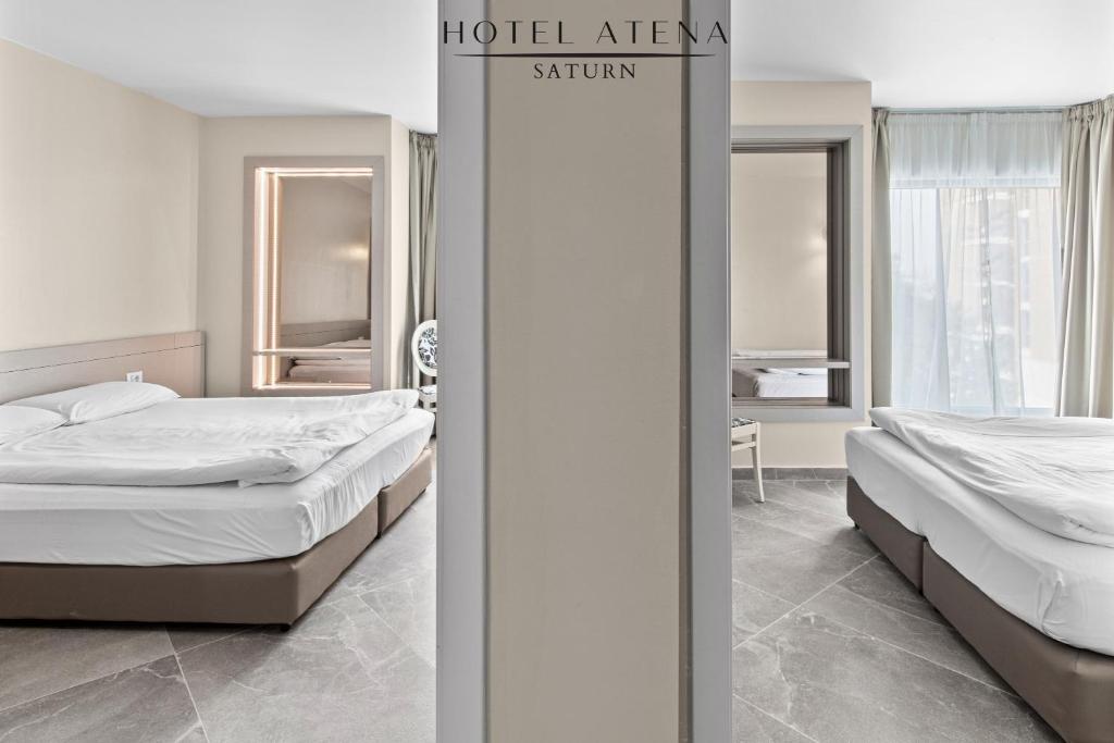 Postel nebo postele na pokoji v ubytování Hotel Atena***