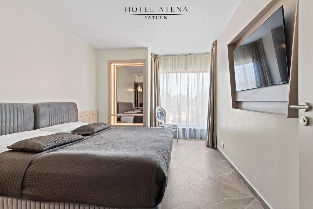 Postel nebo postele na pokoji v ubytování Hotel Atena***