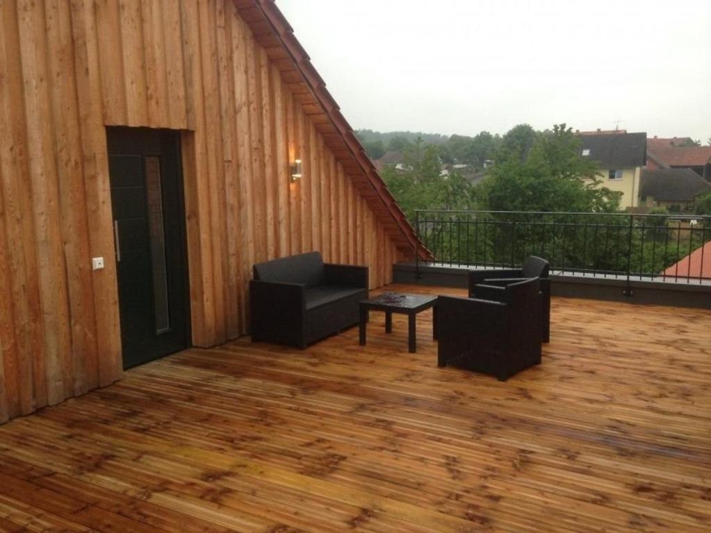 Balkón nebo terasa v ubytování Ferienhof Dipperz Wohnung mit großer Dach-Terrasse