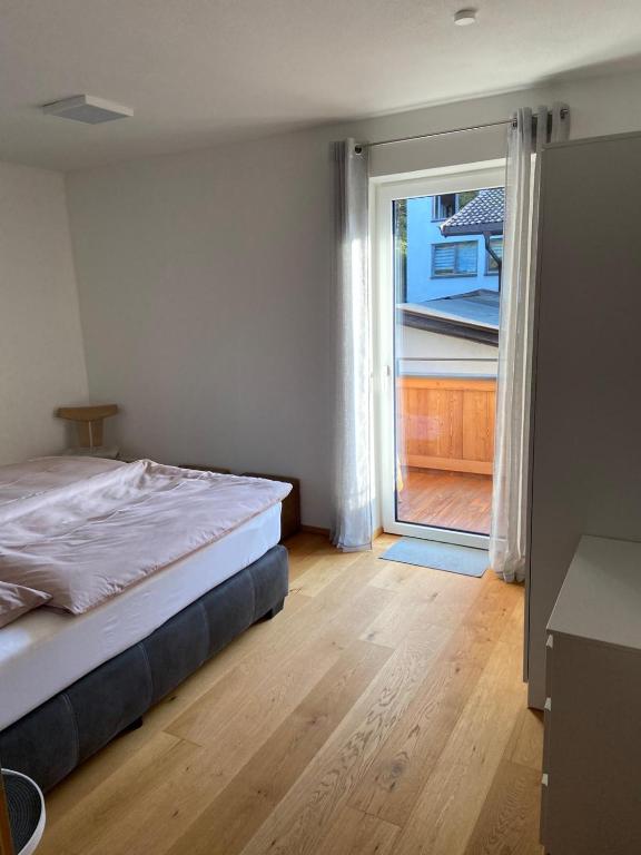 Postel nebo postele na pokoji v ubytování Haus Kaiserblick Top 2
