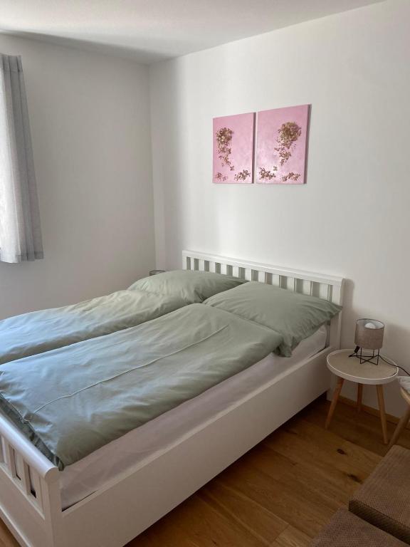 Postel nebo postele na pokoji v ubytování Haus Kaiserblick Top 2