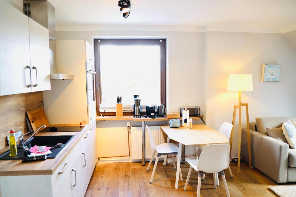 Kuchyň nebo kuchyňský kout v ubytování Apartments Meerzeit C